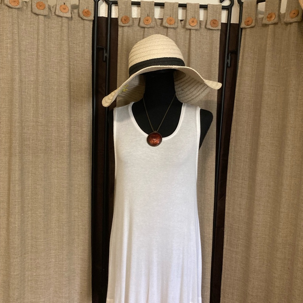 White shirt by merona size large. Looks great with leggings. Great condition.
